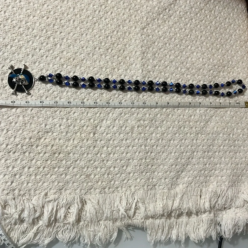 Halloween Skull and Crossbones Pirate necklace with beads.